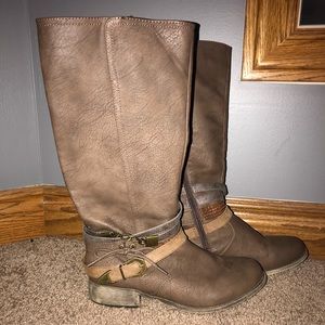 Long brown strappy boots